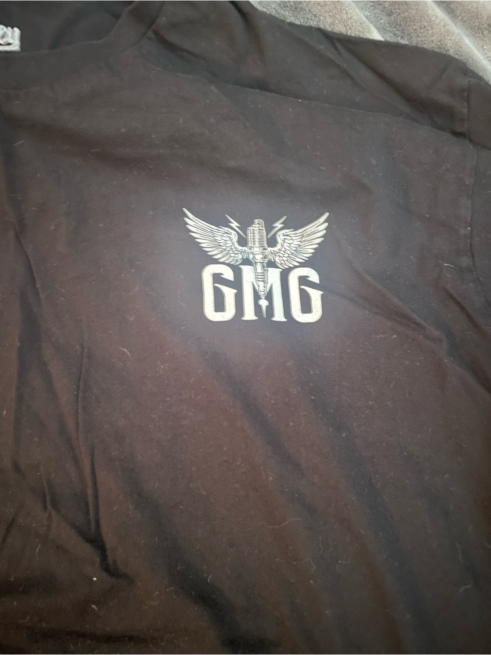 Black Tee with White GMG Winged Microphone Logo from gas monkey garage